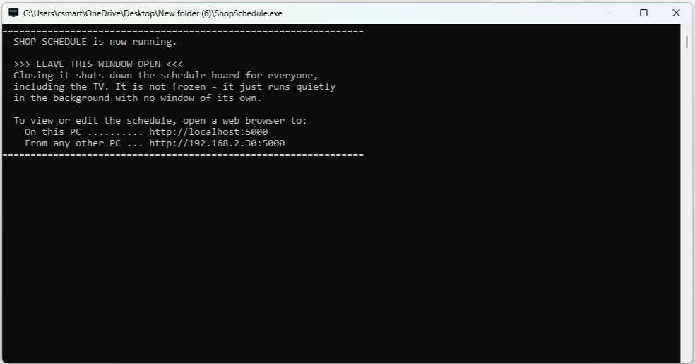 The plain console window that runs the server, with on-screen instructions for where to view the board